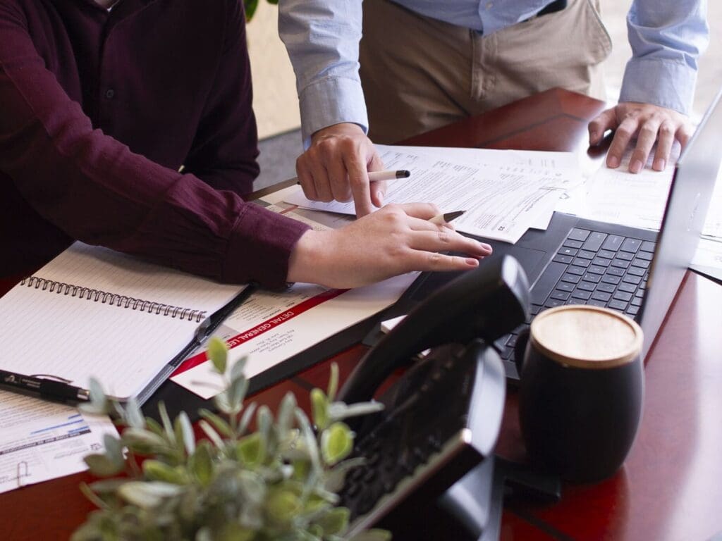 Financial coaches working on a project.