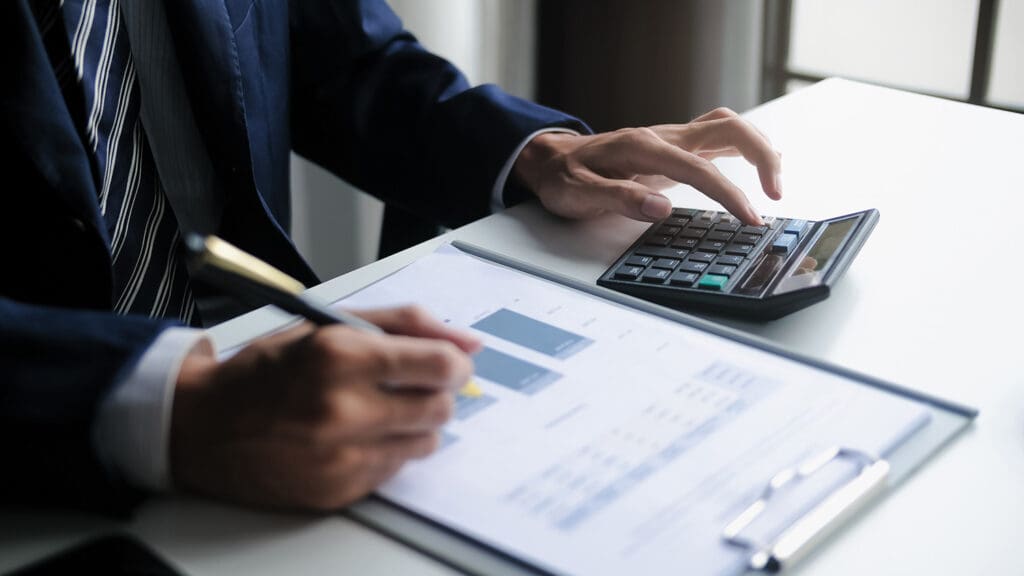 A man reviewing a financial document.